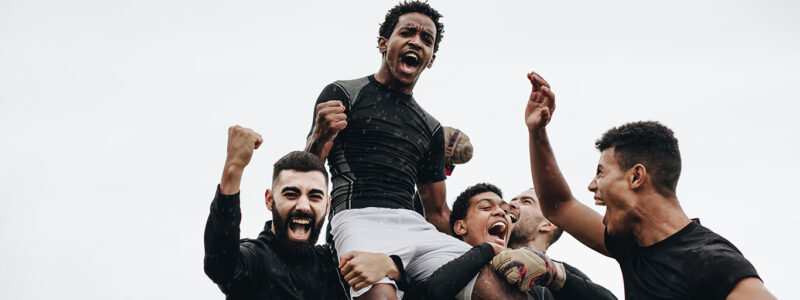 Football players celebrating.